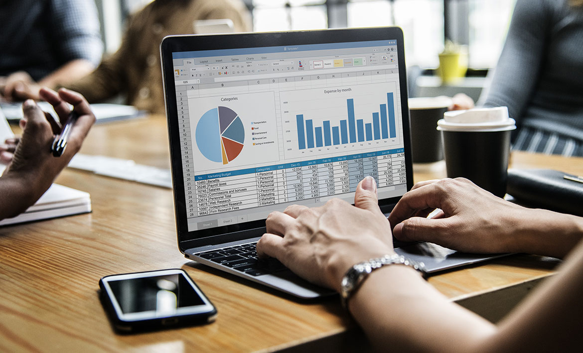 Strategy report displayed on a laptop screen during a meeting, representing the detailed property strategies developed by a buyers agent for clients.